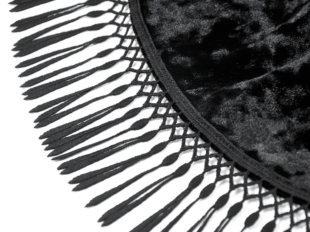 Side profile detail of black velvet gothic maxi skirt showing lace panel construction and layered ruffled design