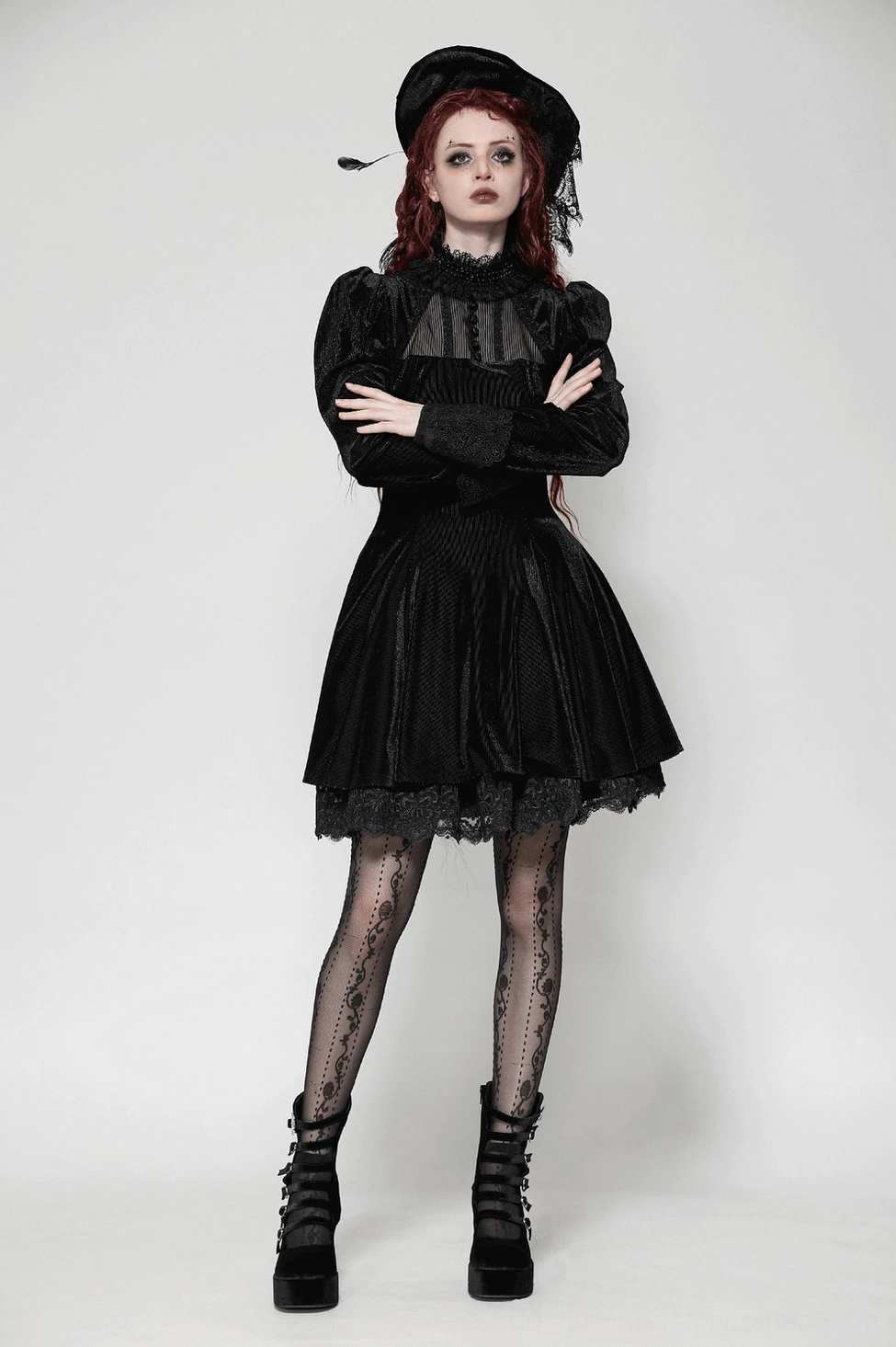 Black velvet gothic mini dress showcasing lace ruffle details, voluminous sleeves, flared hemline, and dark alternative fashion aesthetic
