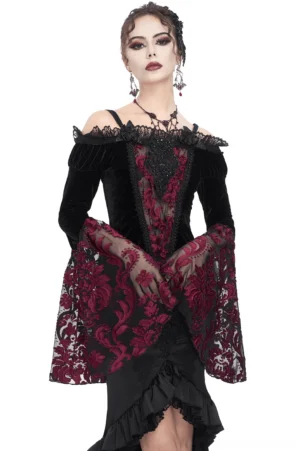 Black velvet gothic off-shoulder top with burgundy lace embroidered sleeves, front three-quarter view on model