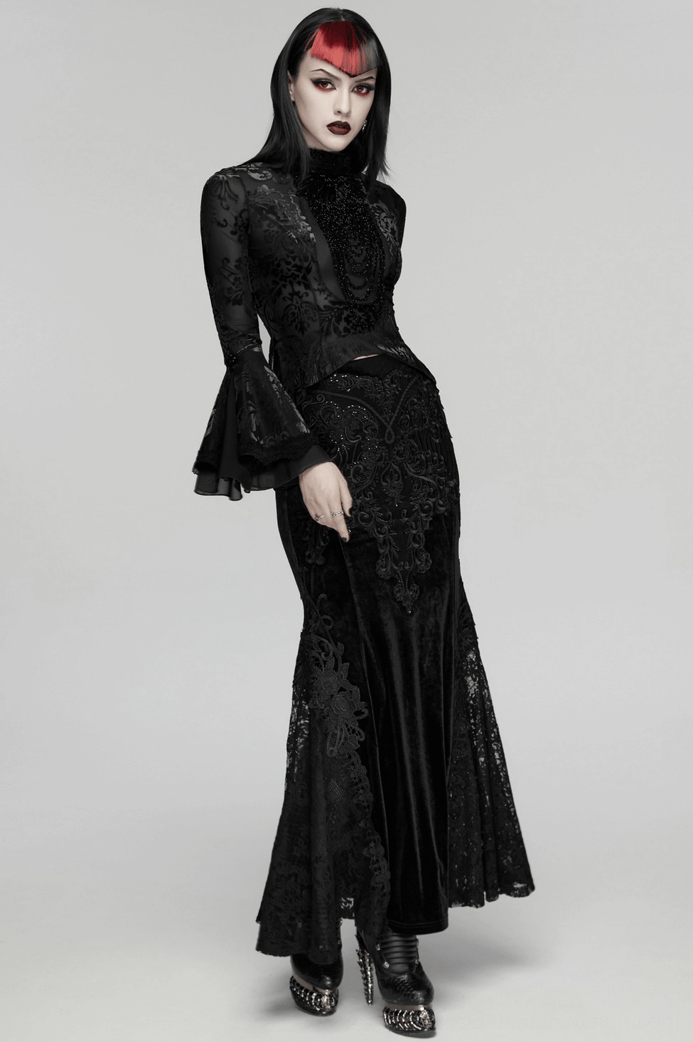 Black burnout velvet gothic top closeup of material texture, damask pattern, and craftsmanship details
