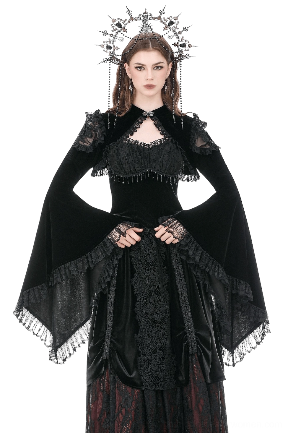 Black velvet lace bell sleeve bolero shrug worn by gothic model with crown headdress, front full body view showcasing dramatic flared sleeves and open-front cape collar design