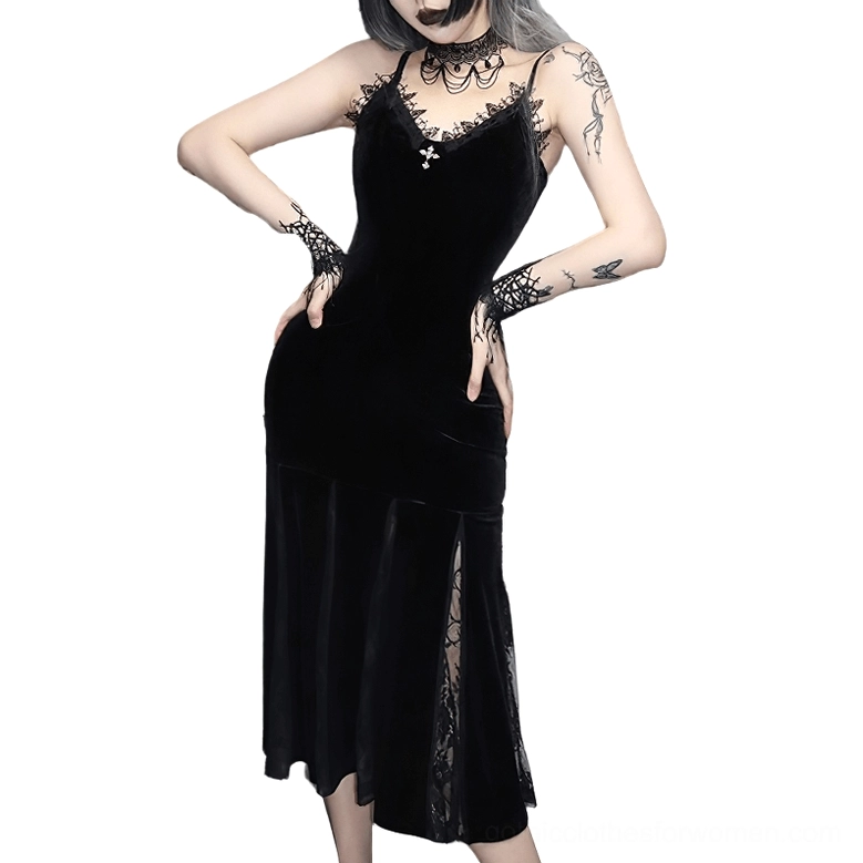 Black velvet mermaid slip dress with lace neckline trim and cross pendant, front three-quarter view on model