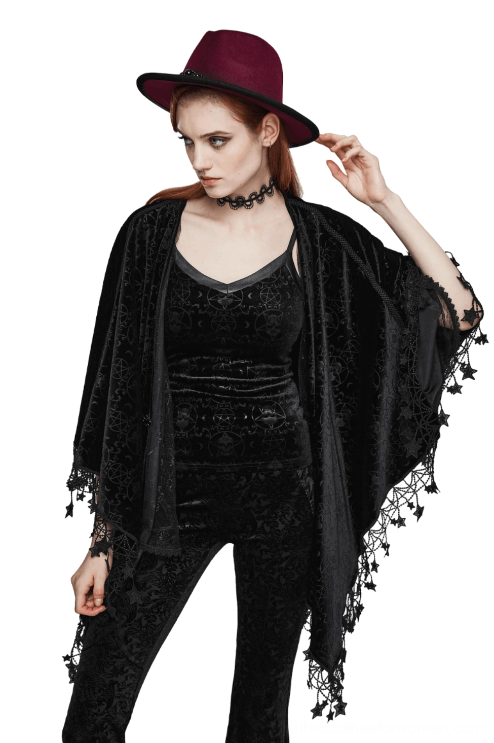 Black velvet occult pentagram cape with star tassel hem worn by female model in front three-quarter view