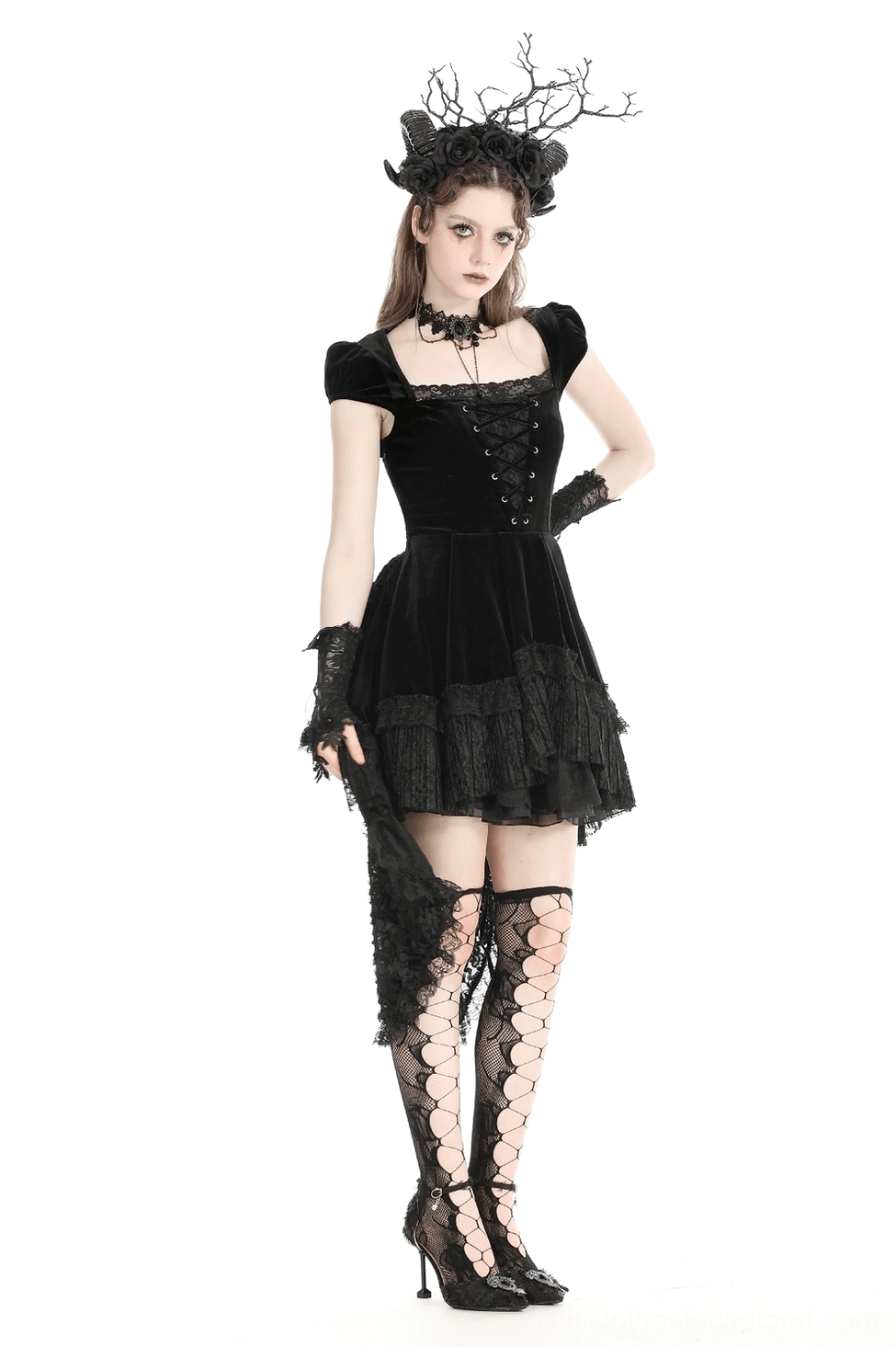 Black velvet swallowtail gothic dress close-up showing intricate lace overlay texture, velvet fabric quality, and detailed construction throughout bodice and skirt