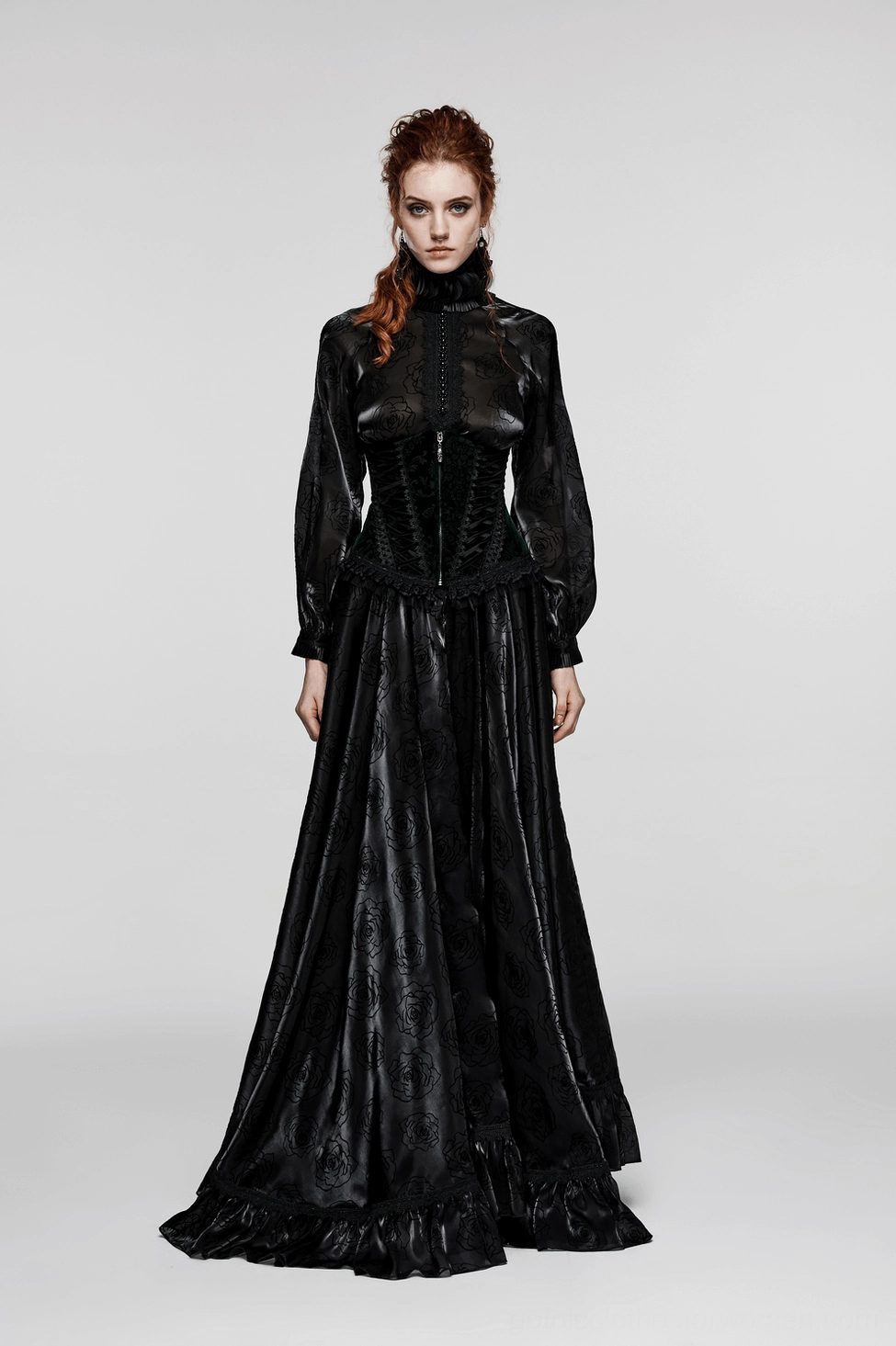 Full product shot of black velveteen victorian gothic corset showing overall structure, front zipper, lace detailing, mesh ruffle hem, and elegant silhouette
