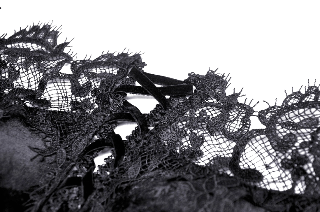 Full-length black gothic gown showing velvet bodice and luxurious lace layering throughout silhouette