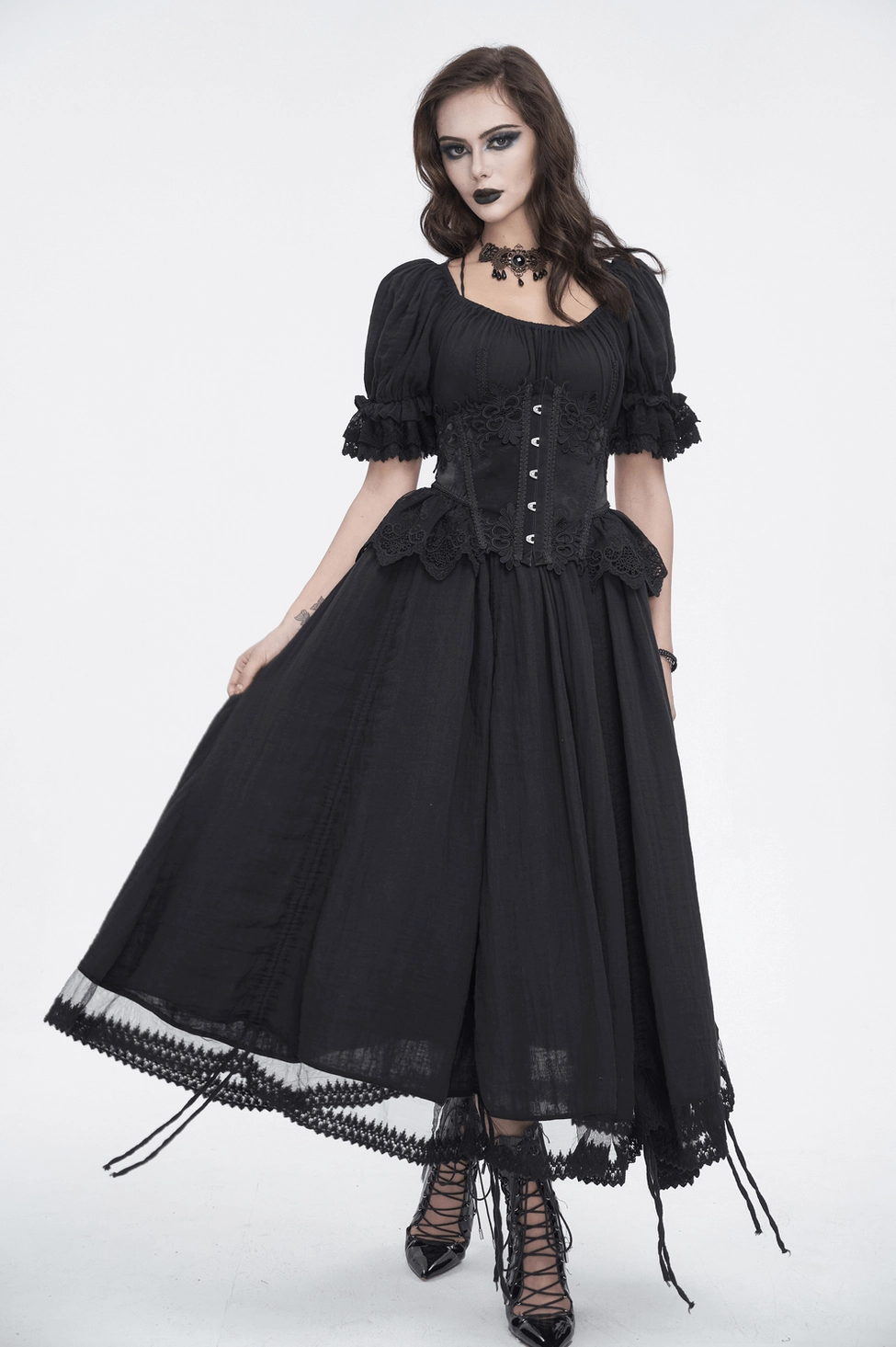Black gothic Victorian puff sleeve dress full length studio shot