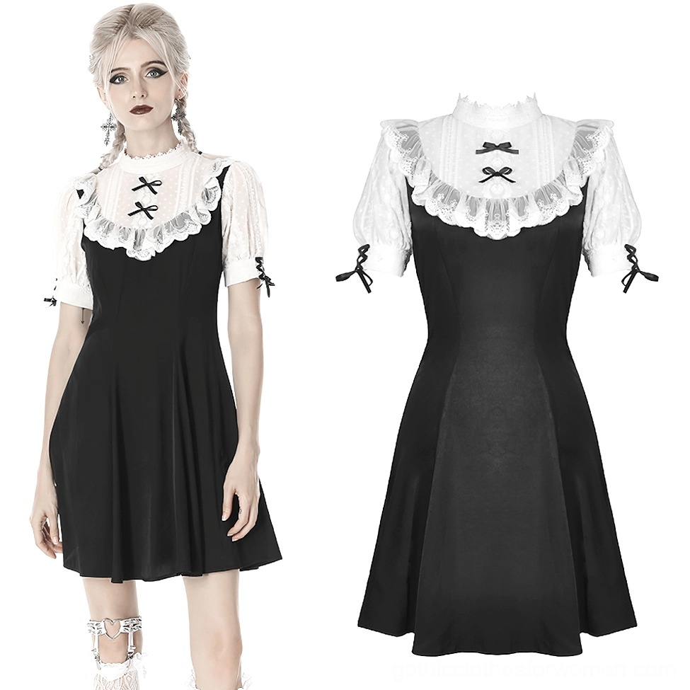 Black and white Lolita style midi dress front view with contrasting color scheme and bow accents