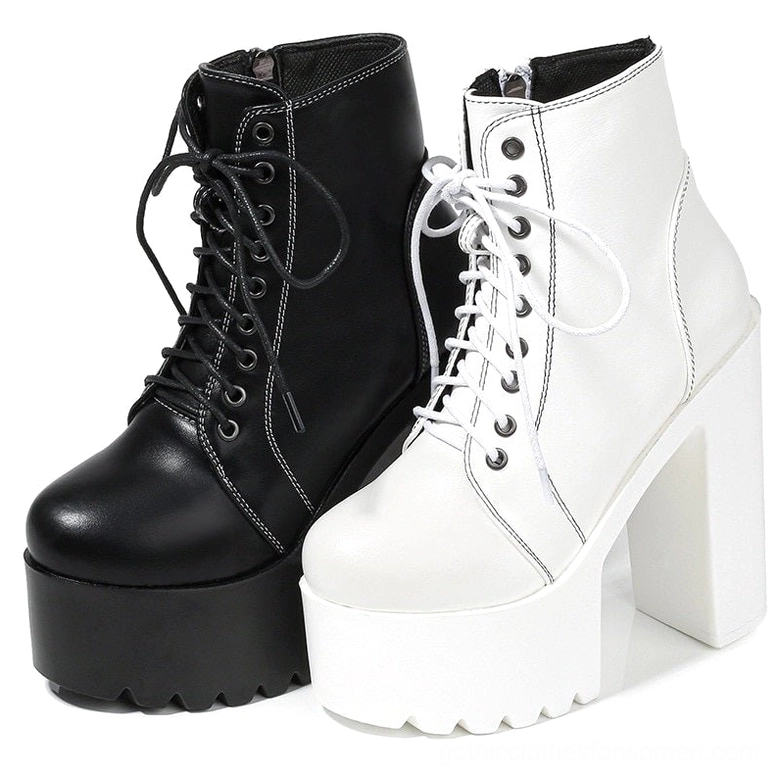Black and white two-tone gothic platform ankle boots, front elevated angle showing contrasting heel platform