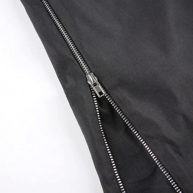 Black wide-leg cargo pants close-up showing metal chain decoration and D-ring hardware details typical of gothic fashion