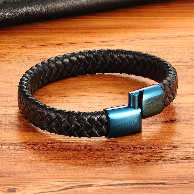 Black woven leather gothic bracelet flat lay with blue magnetic stainless steel clasp