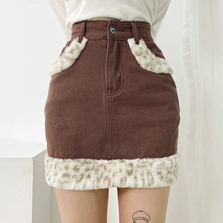 Blue denim mini skirt with brown leopard faux-fur hem, front worn model view
