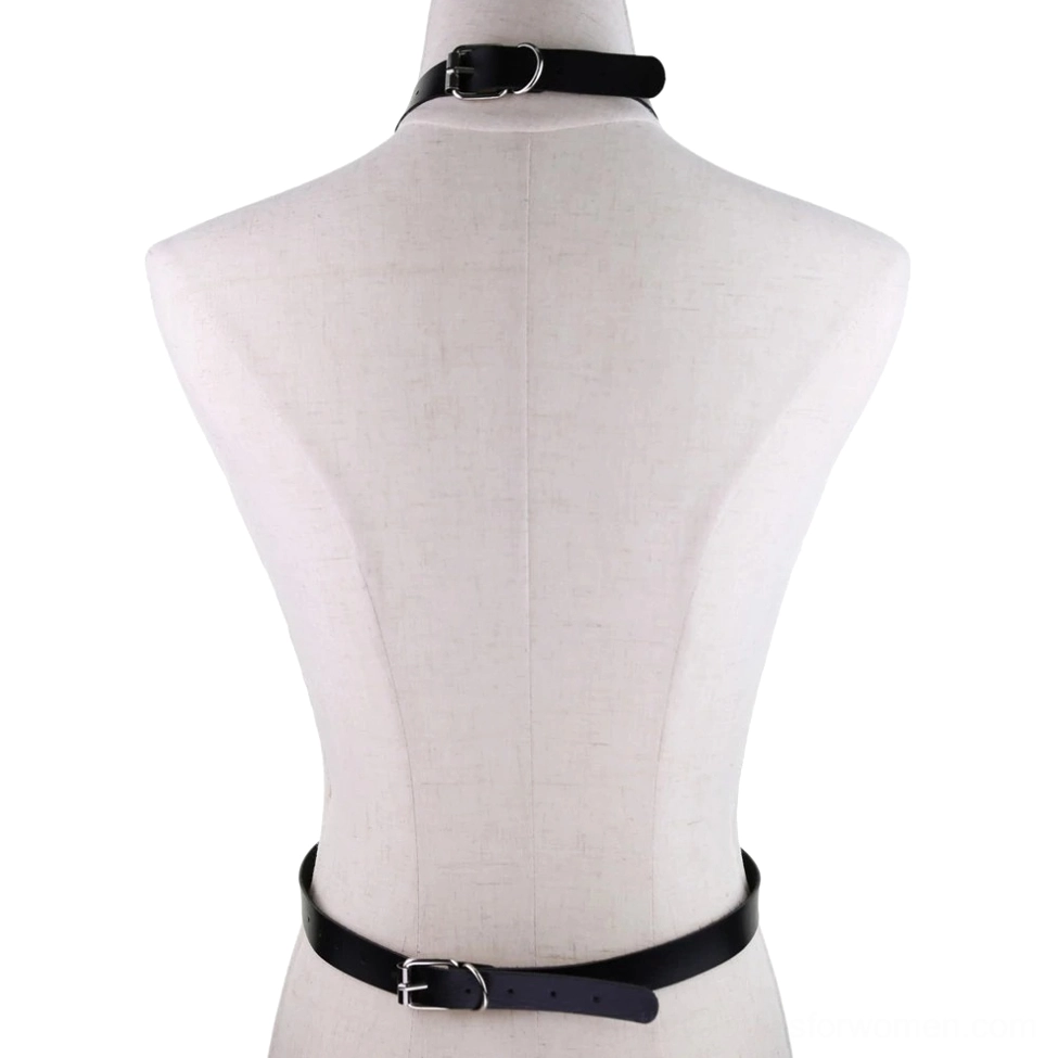 Vegan leather body harness detail shot showing metal O-rings and chain connectors