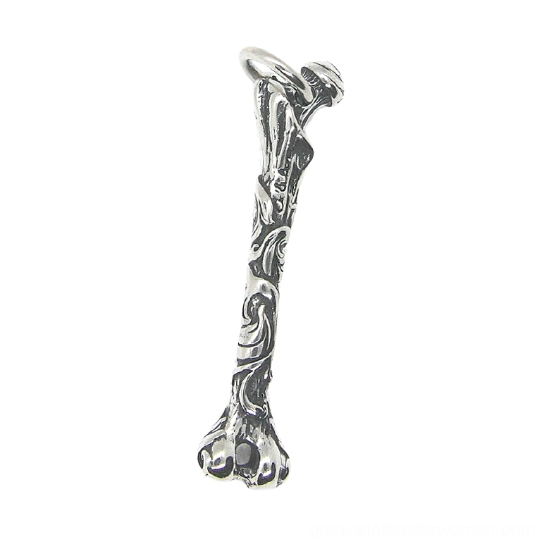 Vintage engraved bone pendant necklace front view showing detailed ornamental design