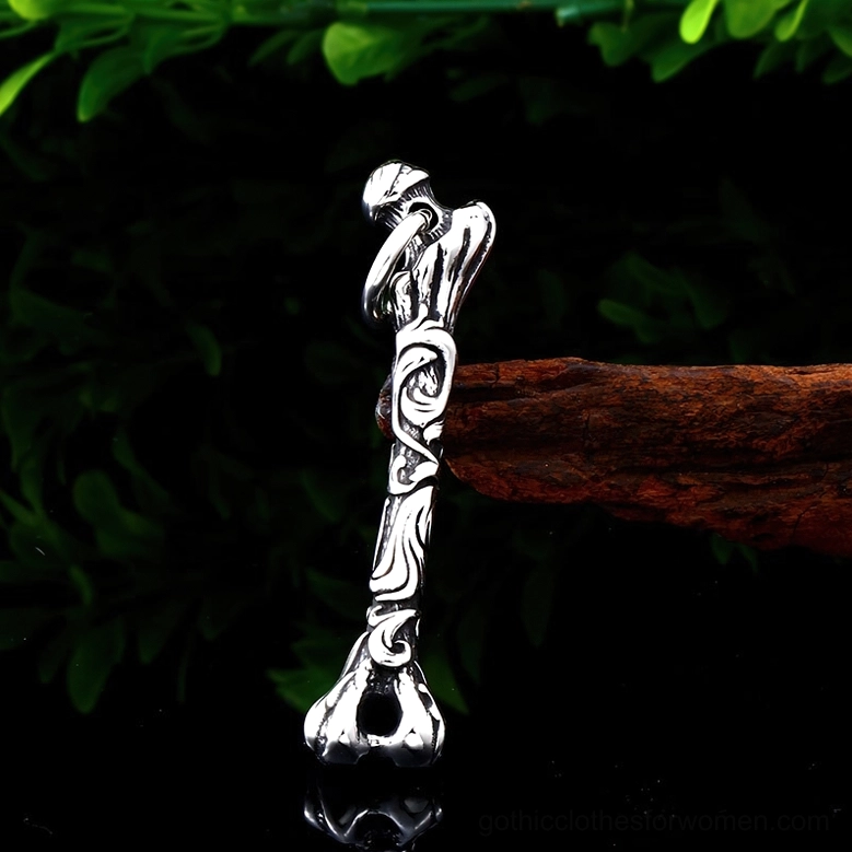 Silver bone pendant necklace side profile with vintage floral finish and natural lighting