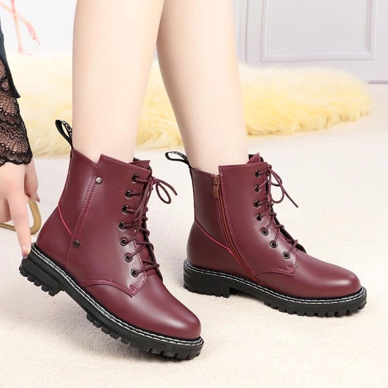 Combat boot lace and zipper dual entry system providing functional gothic utility wear