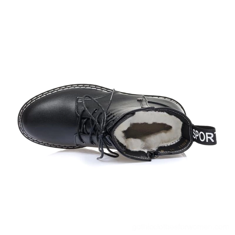Gothic ankle boot sole detail showing black rubber outsole with deep lug tread pattern