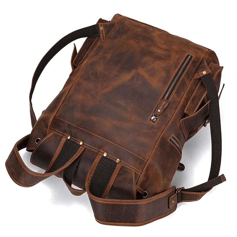 Brown leather gothic backpack side oblique view with padded mesh detail
