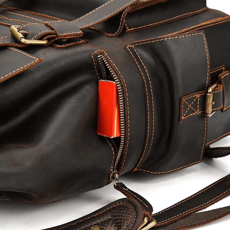 Brown gothic leather backpack vintage character aging demonstration