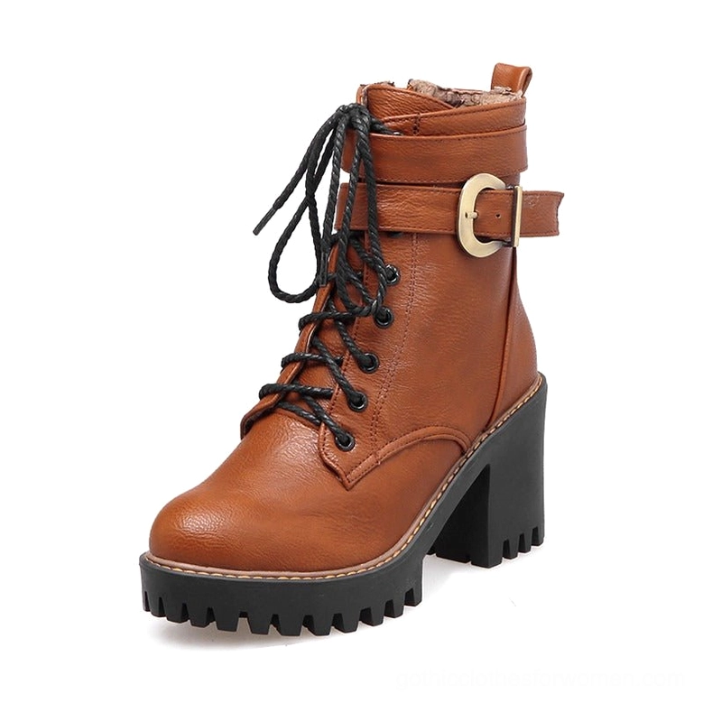 Brown gothic ankle boots with lace-up closure and chunky lug heel - front three-quarter view detail
