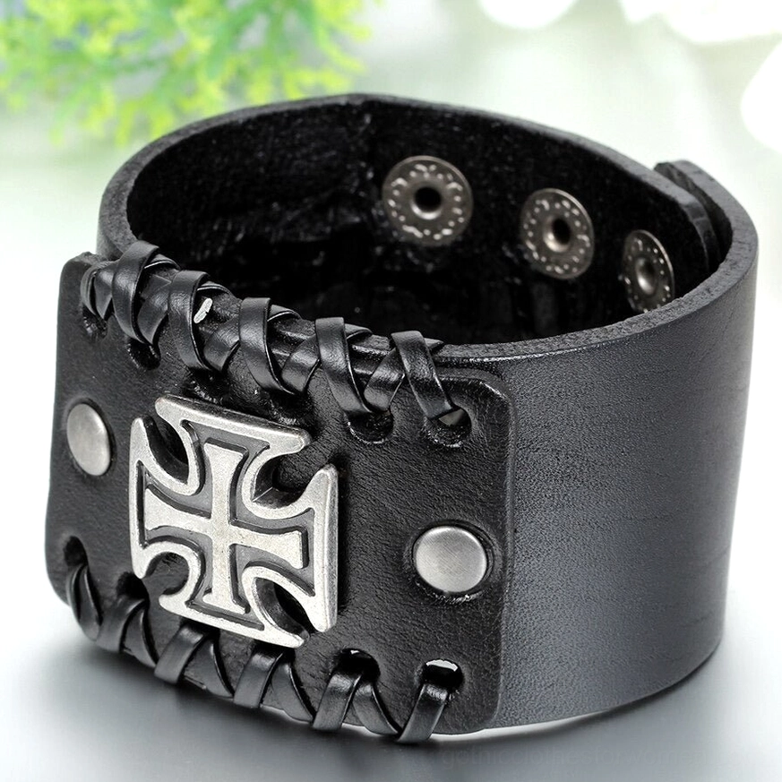 Brown leather gothic cuff bracelet - oblique side view showing stitched construction and metal rivets
