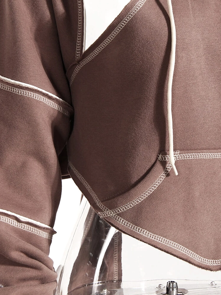 Brown gothic crop hoodie on model three-quarter view displaying alternative style and fit