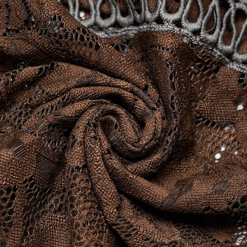 Macro photography of brown floral hollow-cut lace fabric texture showing intricate pattern and sheer mesh composition