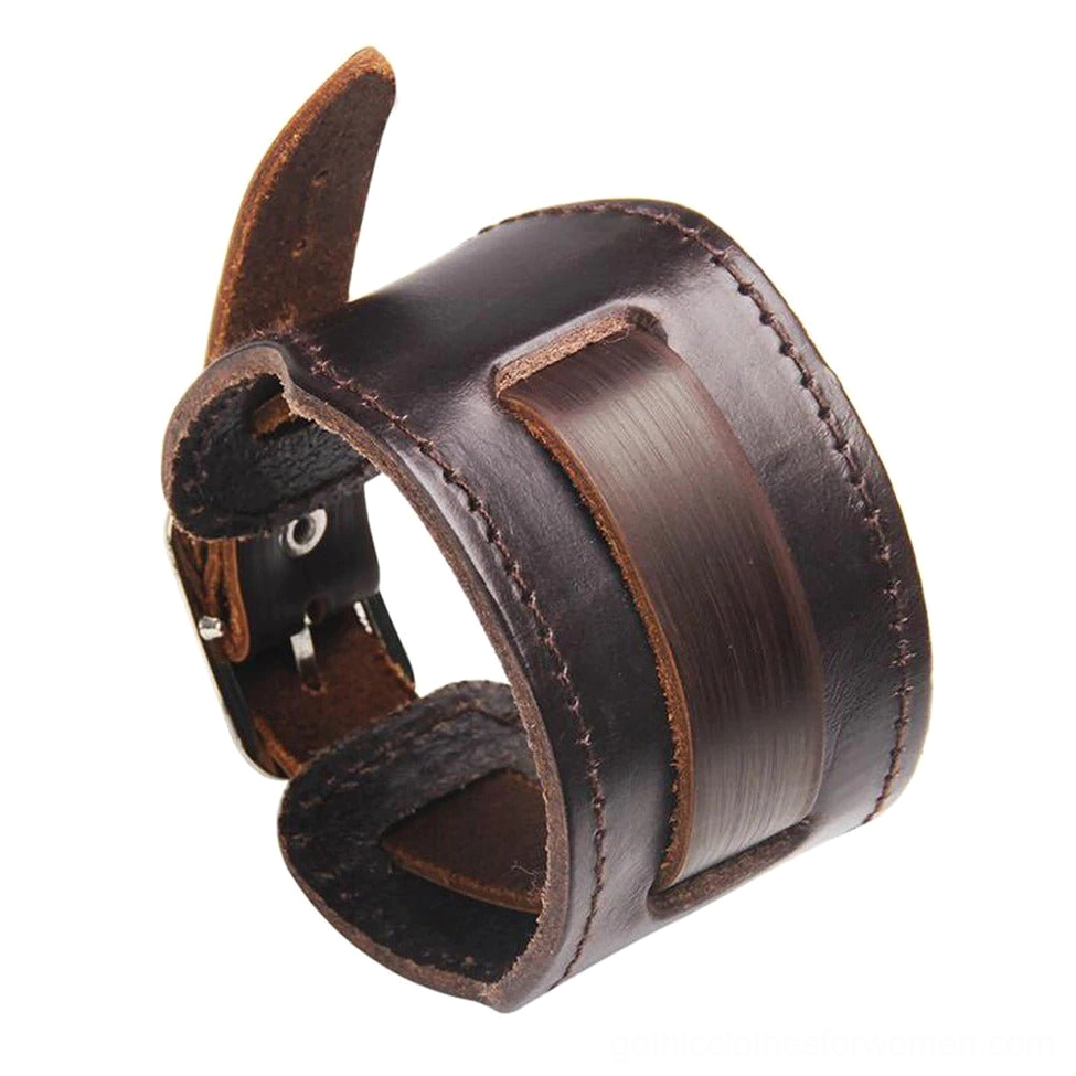 Wide brown genuine leather gothic bracelet with stainless steel buckle, featuring decorative panel and hand-stitched seams, displayed on white background