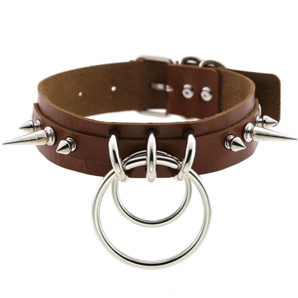 Brown spiked leather choker with double O-rings, silver spike decorations, and adjustable metal buckle closure