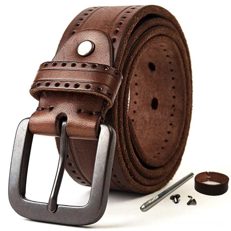 Brown vintage cowskin leather belt featuring gunmetal buckle and authentic brogued embossed details in studio flat lay photography
