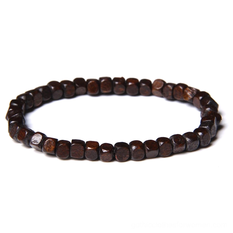 Brown wooden beaded bracelet with dark polished natural wood beads flat lay overhead shot organic gothic aesthetic