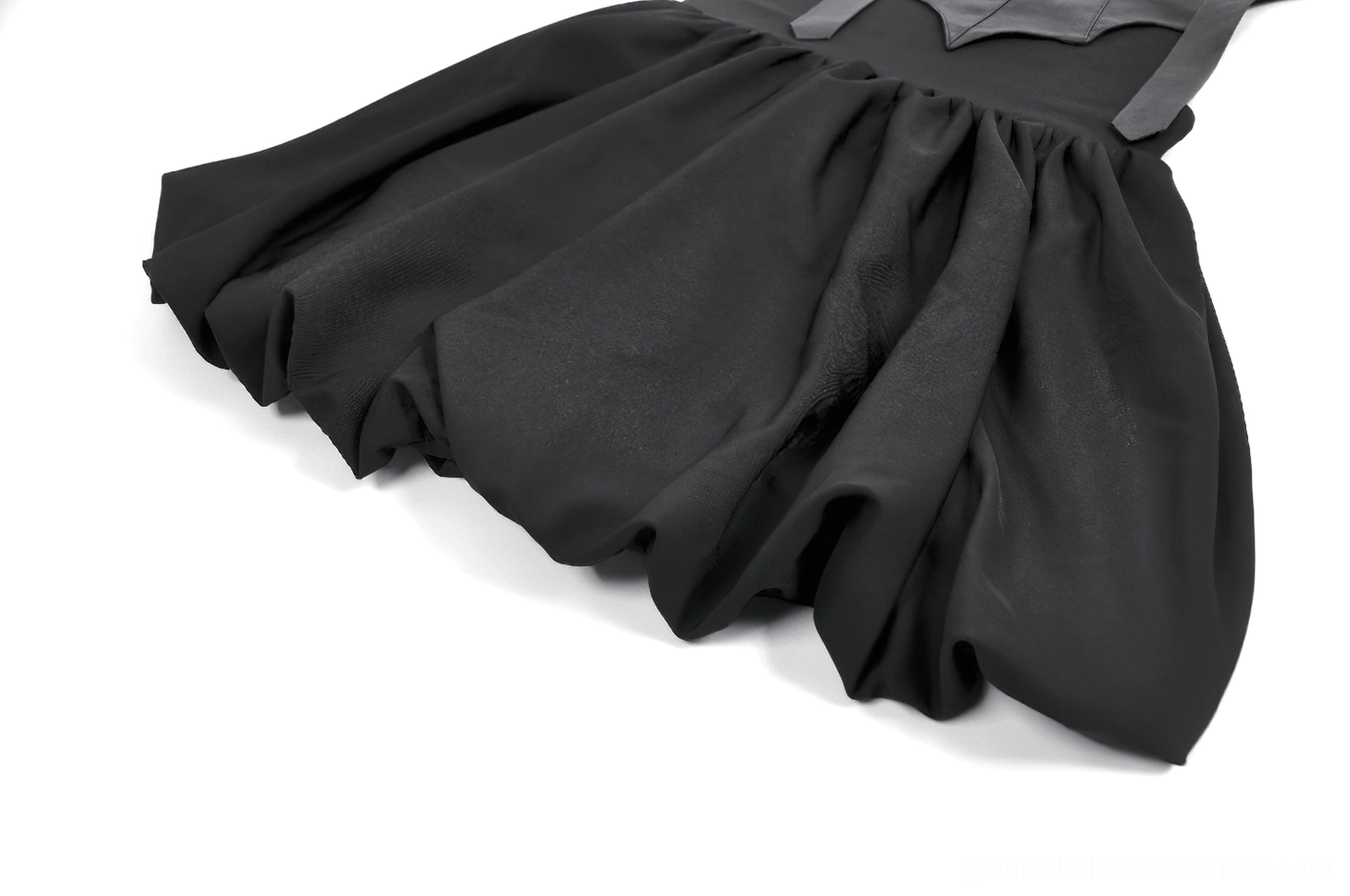 Close-up side view of bubble mini skirt with ruffled hem construction on gothic dress