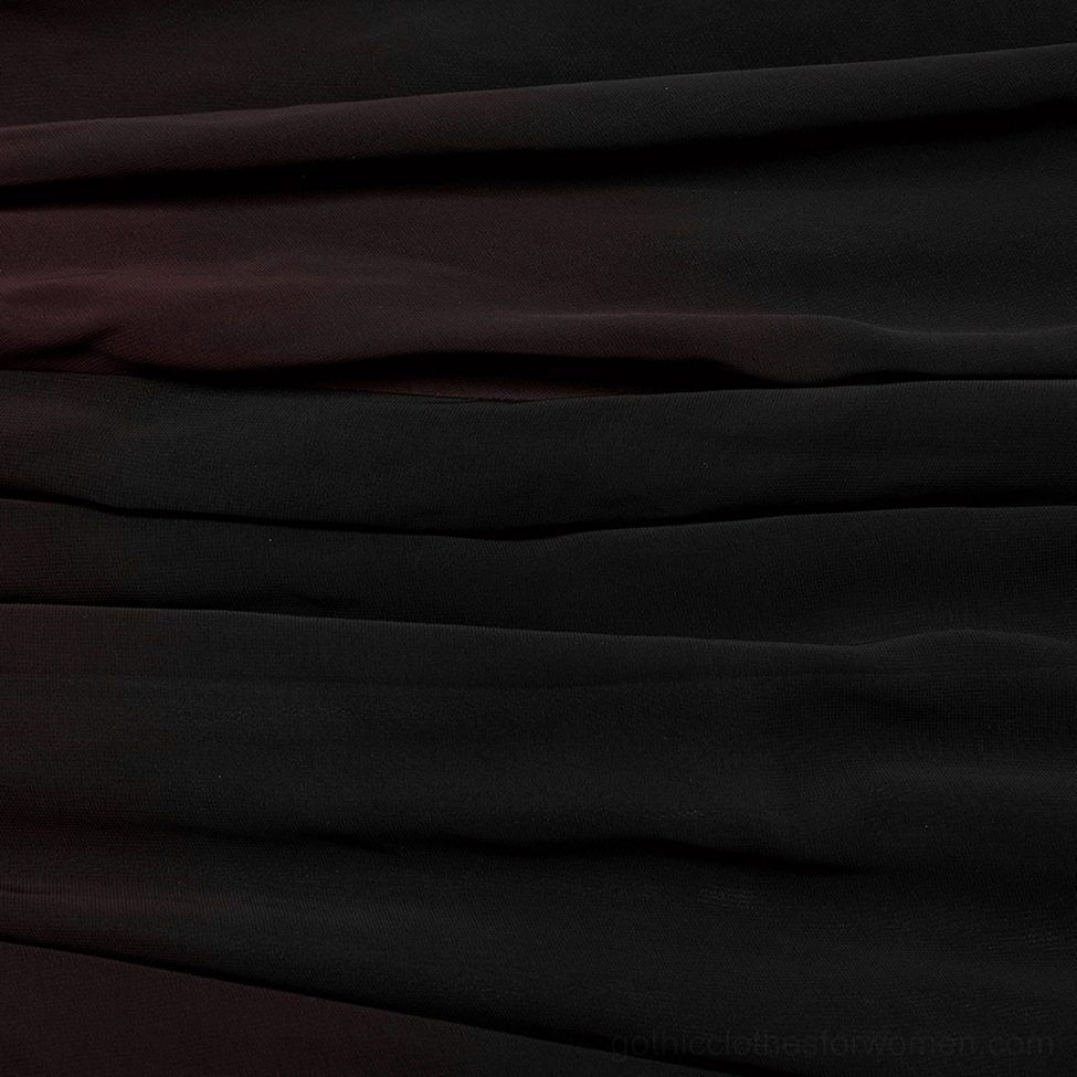 Full length burgundy and black ombre gothic maxi dress on model with curly hair