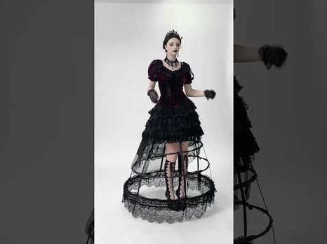 Side profile view of burgundy Victorian bolero shrug with elegant lace trim and mesh ruffle details