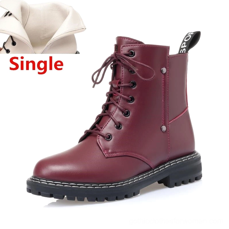 Burgundy leather ankle boot side three-quarter view with smooth leather texture detail