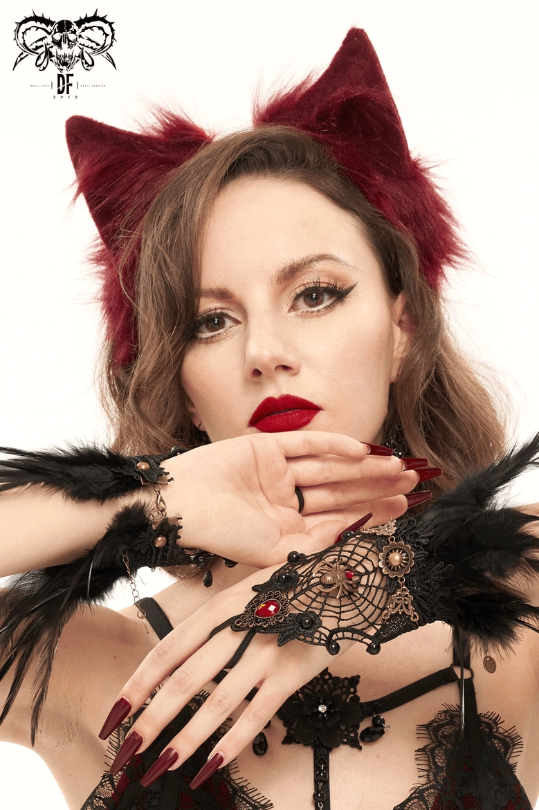 Low angle view of burgundy cat ear headband showcasing plush faux fur texture and ear structure