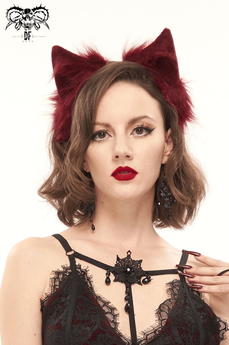 Burgundy faux fur cat ear headband worn with model touching shoulder, gothic aesthetic