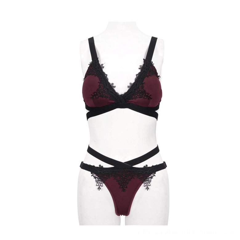 Burgundy gothic lace bikini on mannequin front view displaying scalloped lace trim and cross waist straps