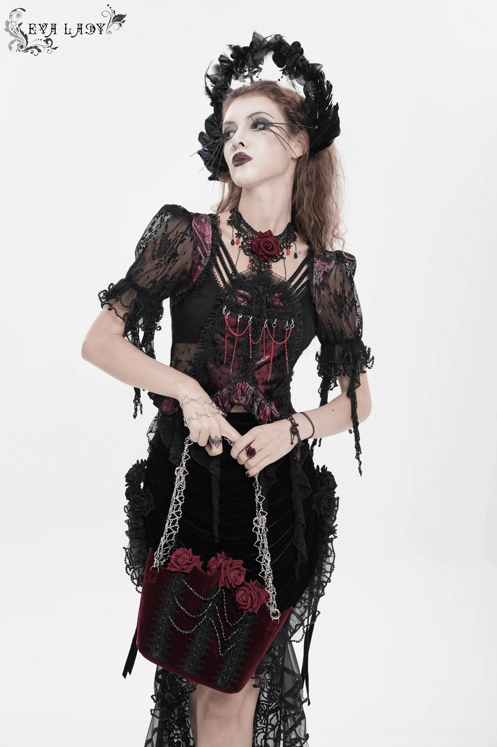 Burgundy gothic rose handbag handling demonstration showing detachable chain straps and secure attachment points
