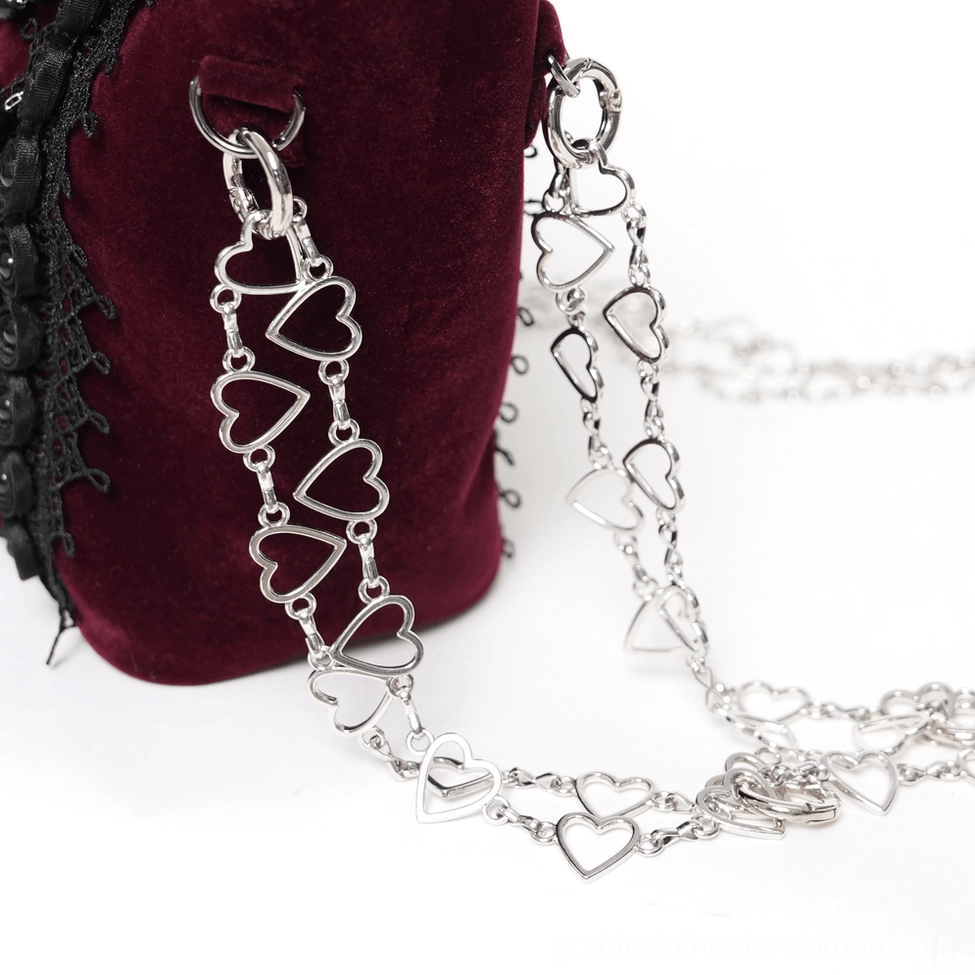 Burgundy gothic rose handbag display showing complete design elements including roses, chains, lace, and burgundy velvet construction
