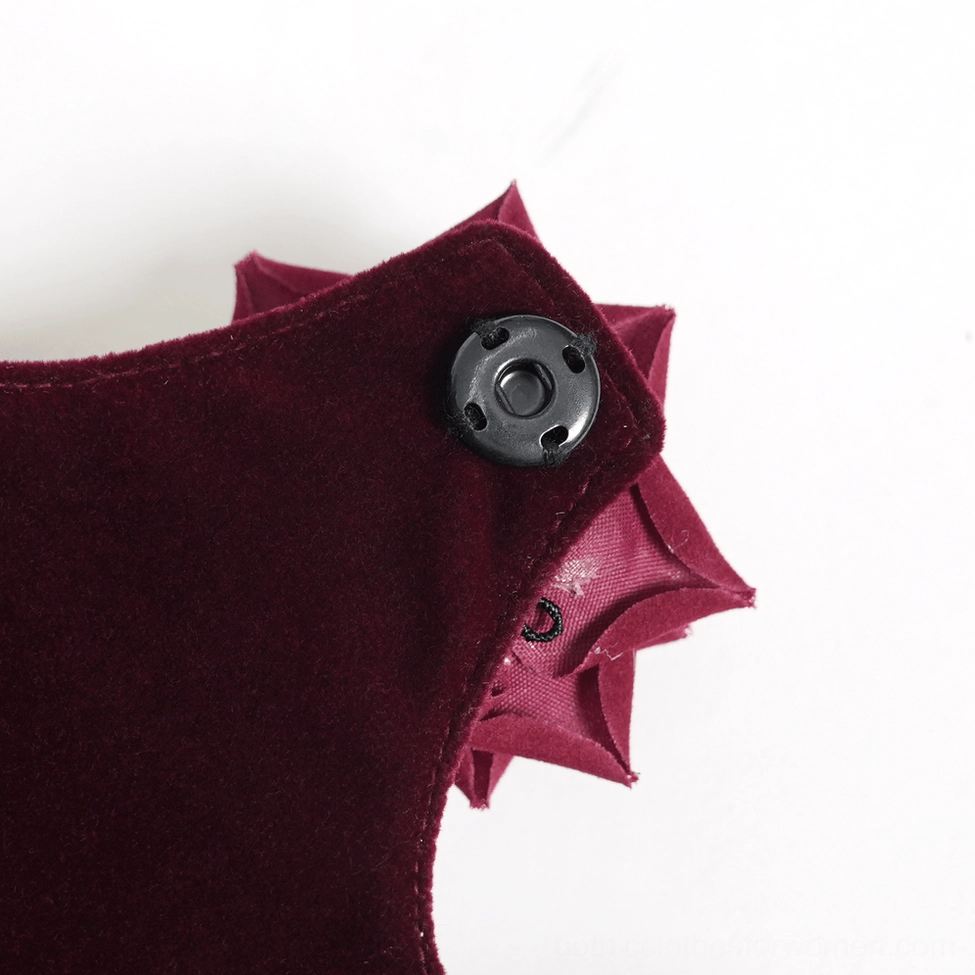 Burgundy gothic rose handbag showcasing silver heart chain straps, structured frame, and rich velvet fabric texture