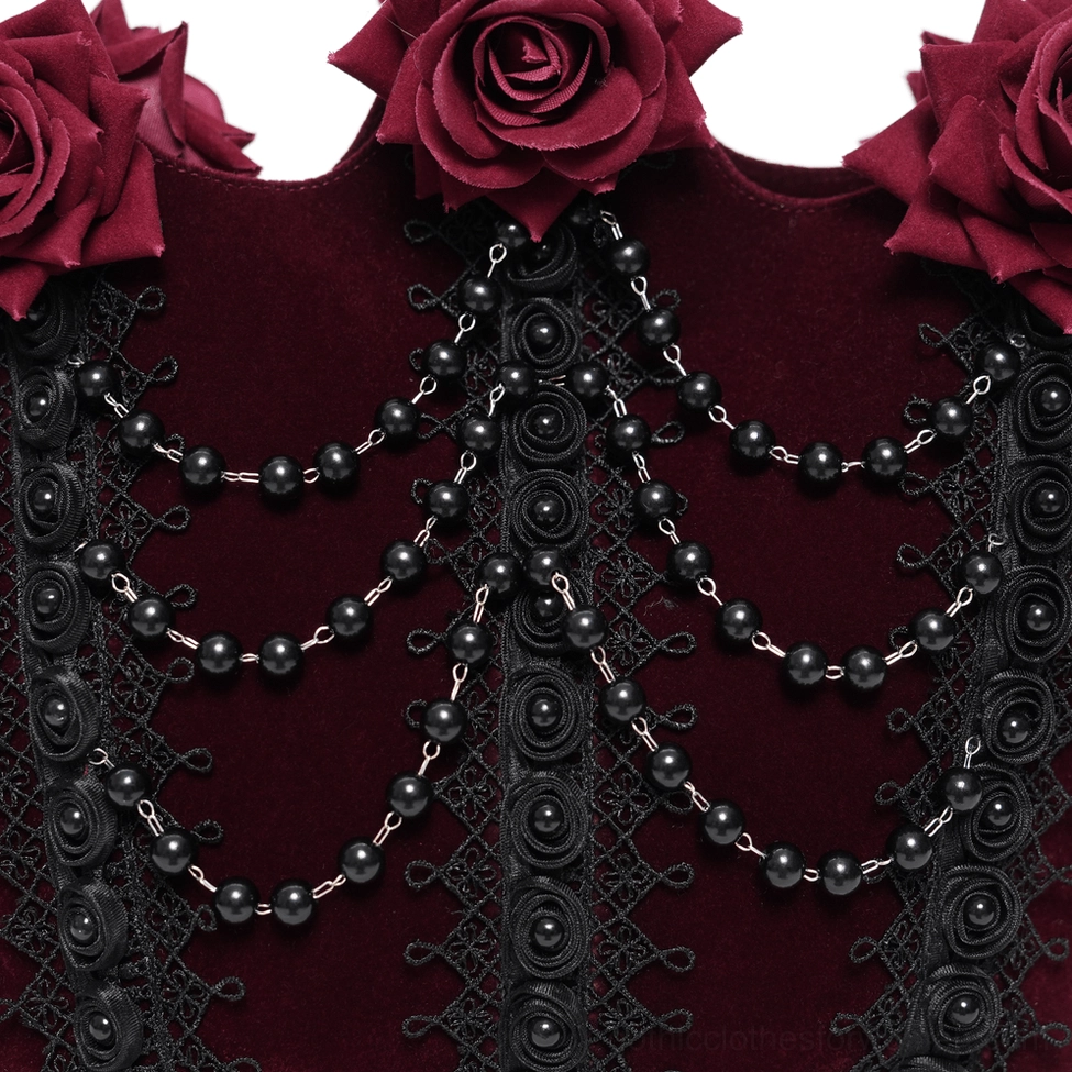 Burgundy gothic rose handbag featuring ornate black lace panels, draped bead strands, and detailed decorative embellishments