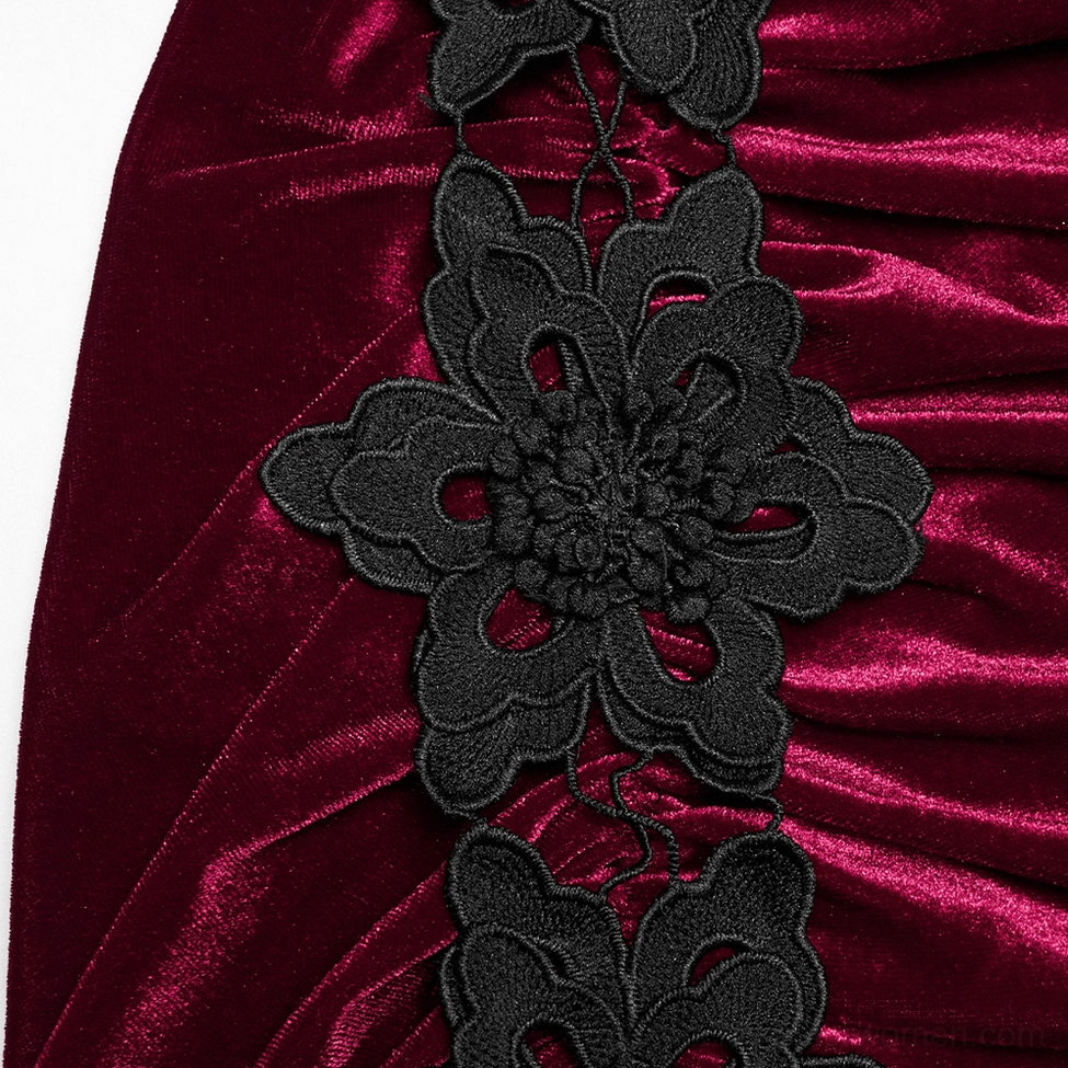 Close-up detail of 3D black floral lace appliqué on burgundy velvet gothic mermaid skirt