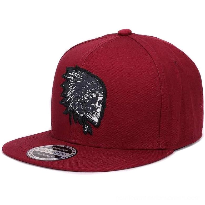 Burgundy wine red gothic snapback cap with embroidered skull design side angle