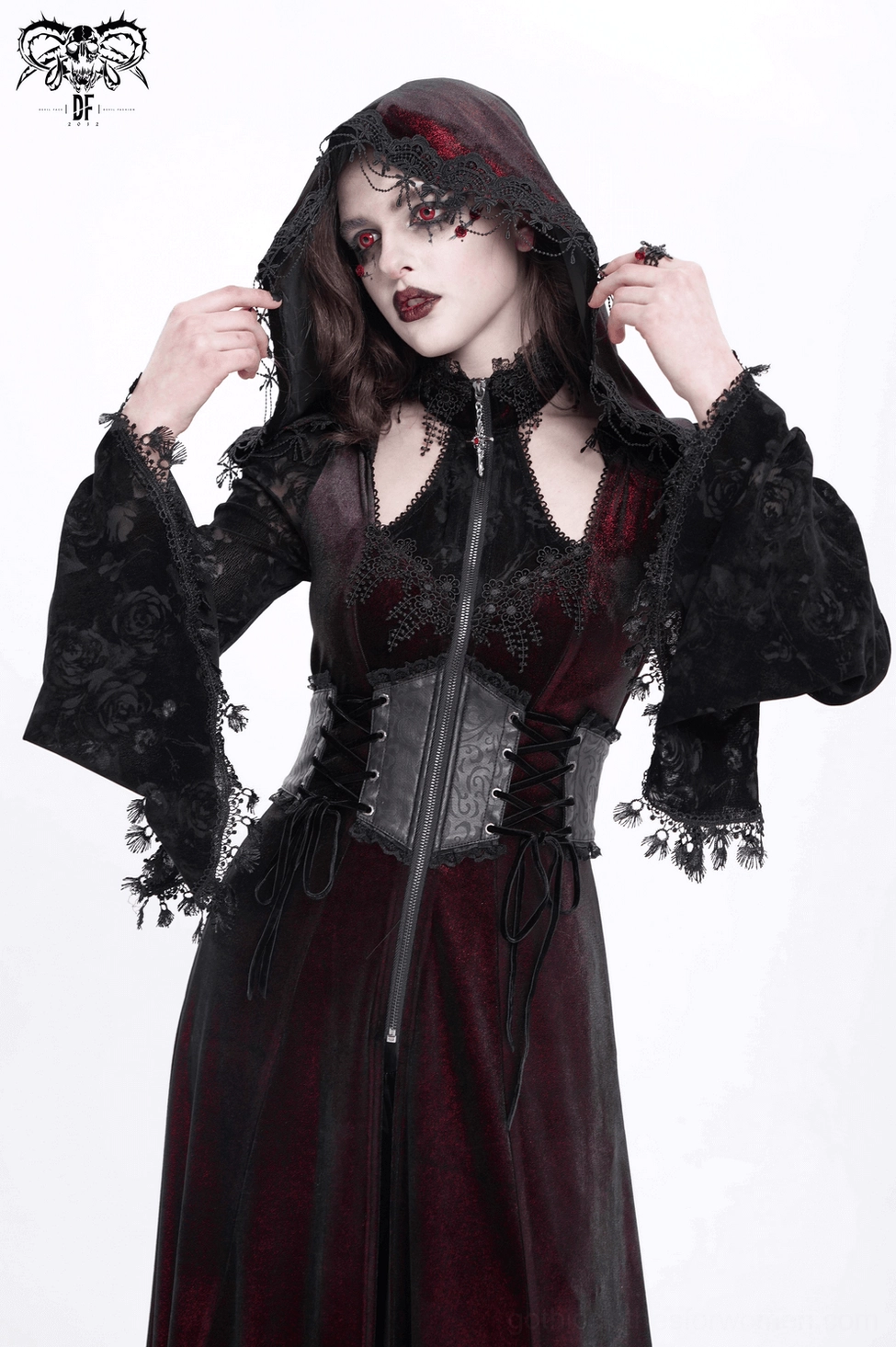 Burgundy gothic velvet hooded maxi coat with black lace sleeves and detachable corset belt, mannequin display alternative view