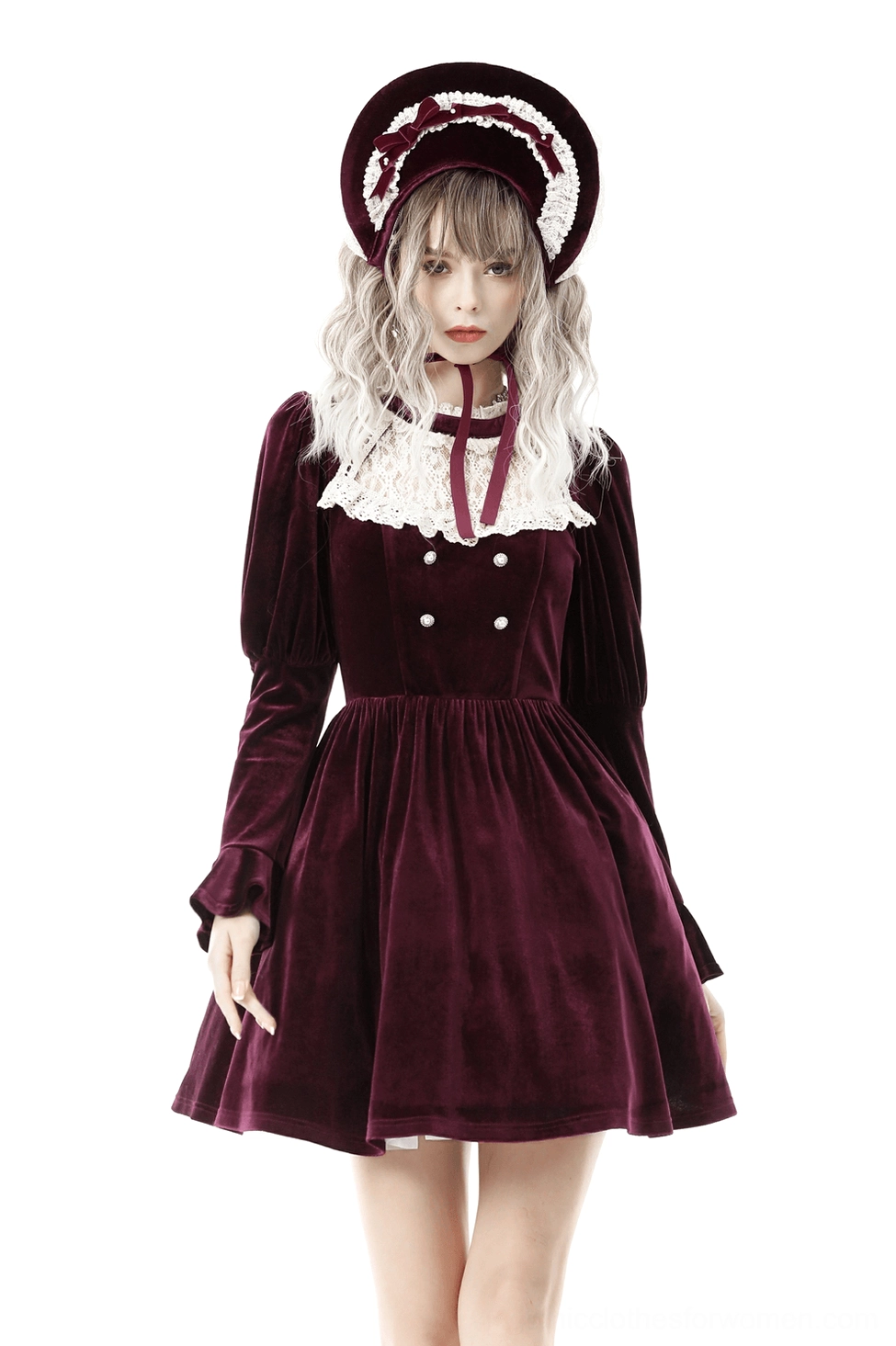 Burgundy gothic velvet dress with white lace collar and red neck tie, front three-quarter view on model