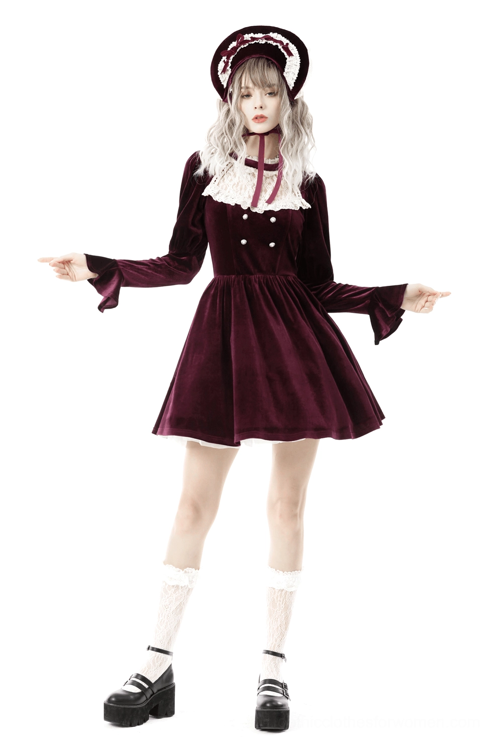 Burgundy velvet gothic dress detail shot showcasing delicate lace work and burgundy fabric richness