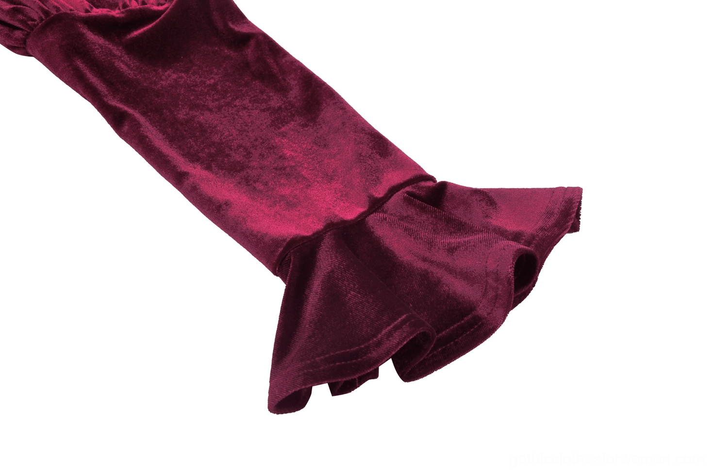 Burgundy gothic velvet dress with lace accents styled with coordinating accessories on display