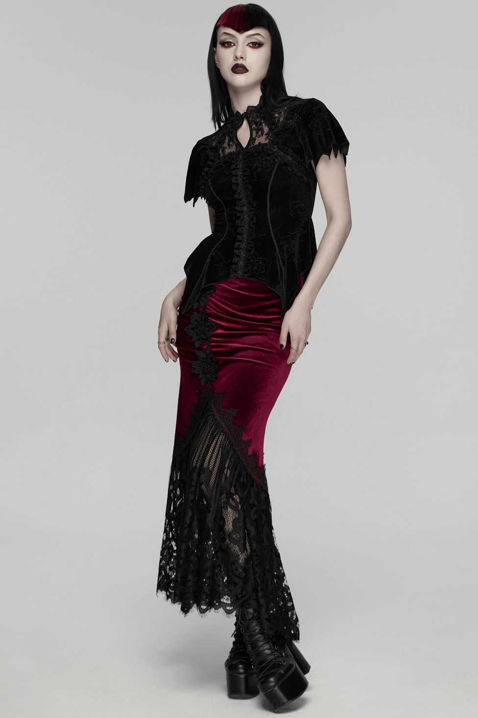 Burgundy velvet texture and black floral lace contrast on gothic mermaid skirt close-up