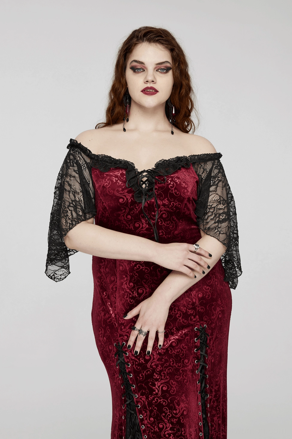 Gothic burgundy velvet evening gown full view - embossed velvet texture with black lace accents and dramatic silhouette